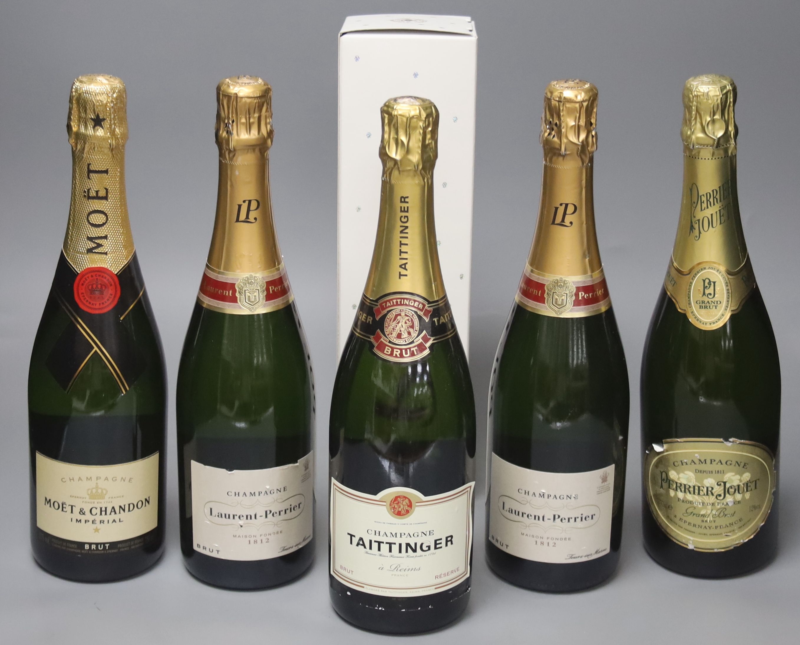 Six bottles of champagne, including Taittinger, Moet et Chandon, Pol Roger and Laurent Perrier